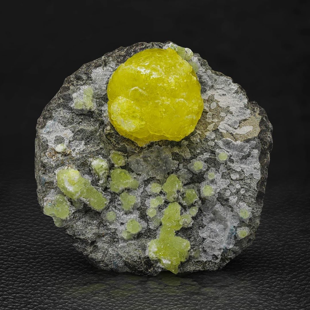 Isolated Lemon Yellow Brucite Ball on Chromite Matrix from Pakistan