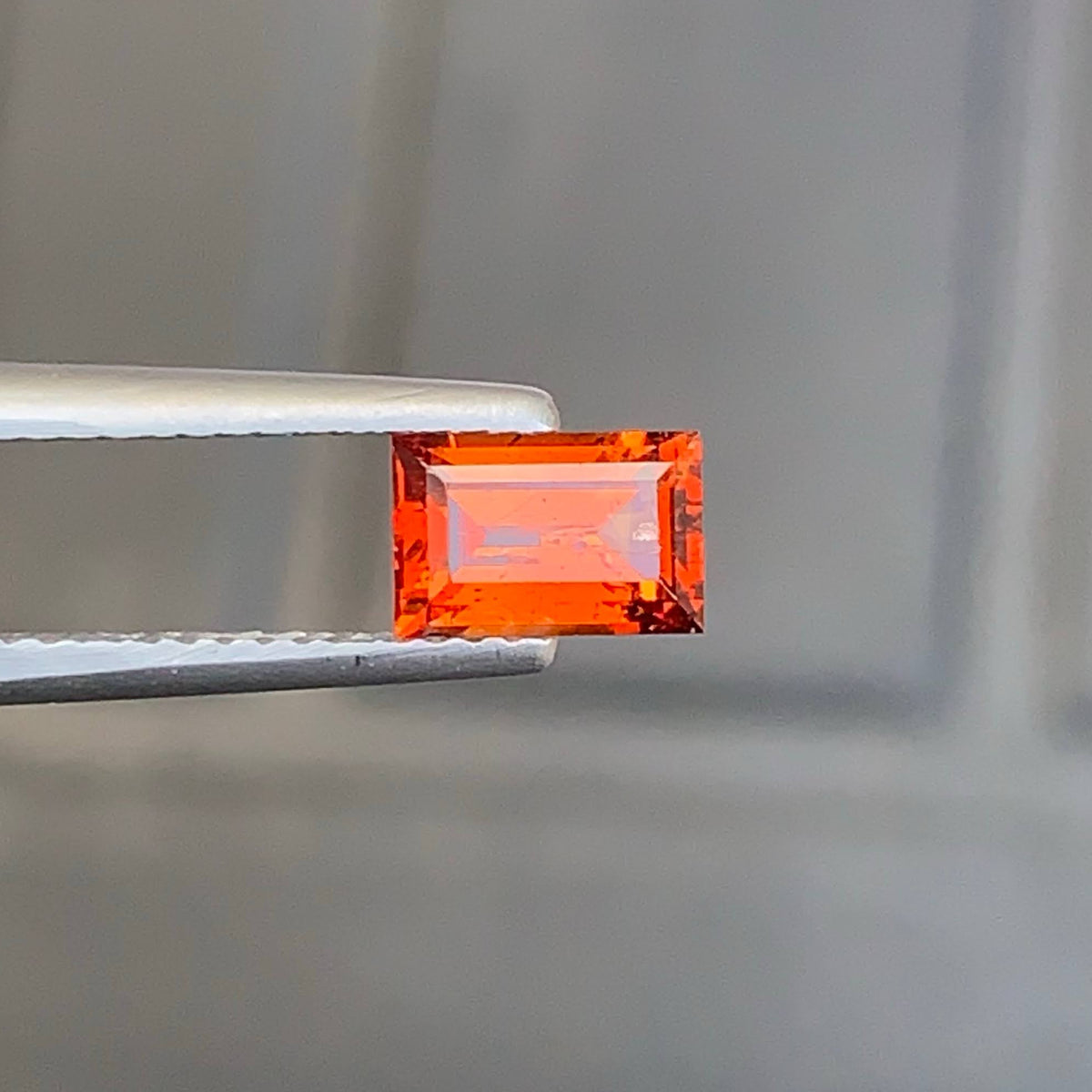 1-00-carat-bright-orange-spessartite-garnet-baguette-cut-tanzanian-shop-now
