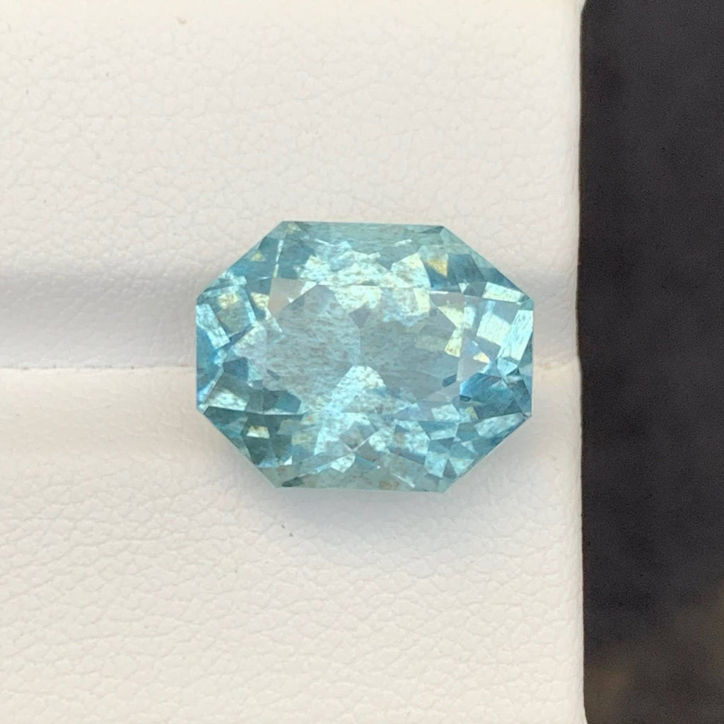 10.65 Carat Blue Aquamarine Faceted blue gemstone on a white background