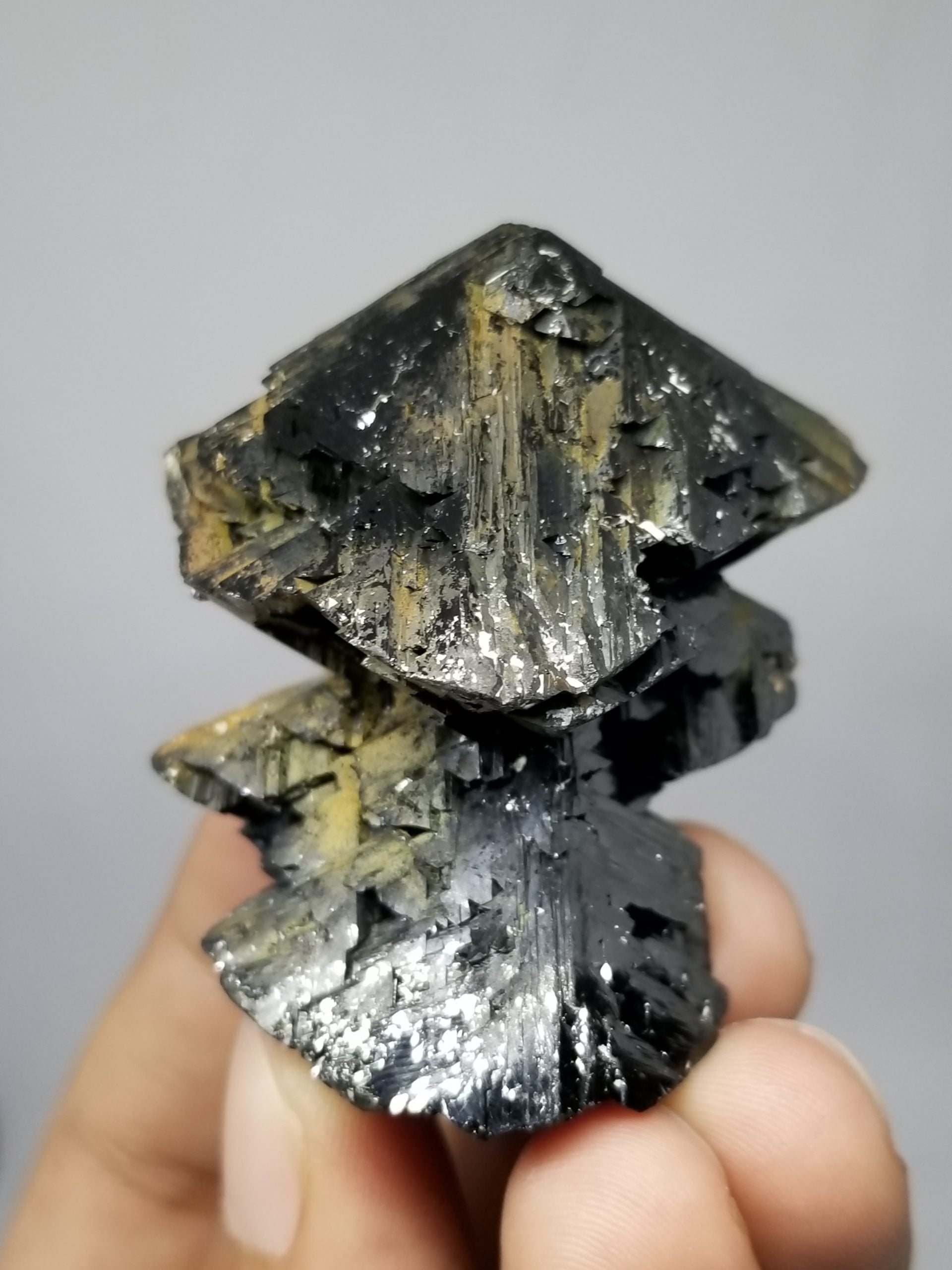 Cassiterite with nice crystal habit and shiny luster with gray background at gandhara FIne Minerals