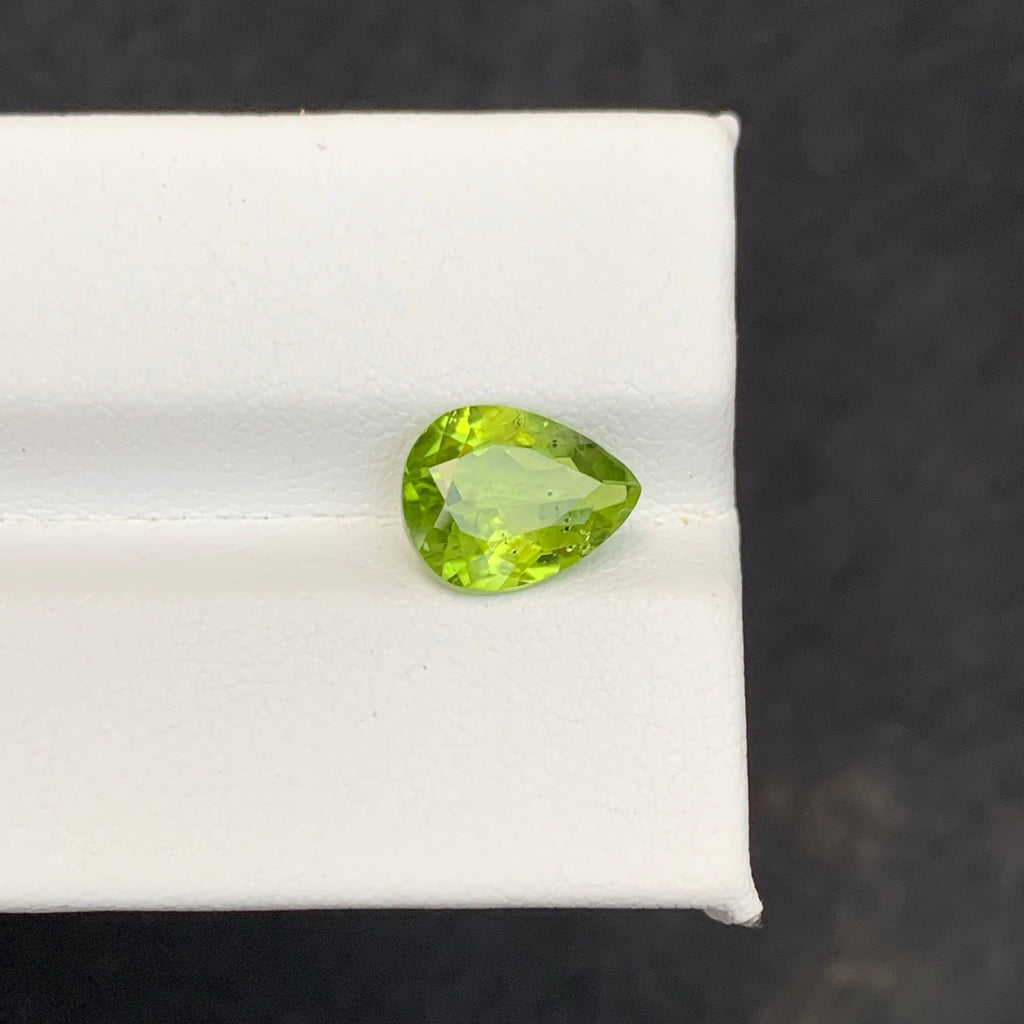 2.56 Carat Apple Green Peridot Green gemstone on a white 