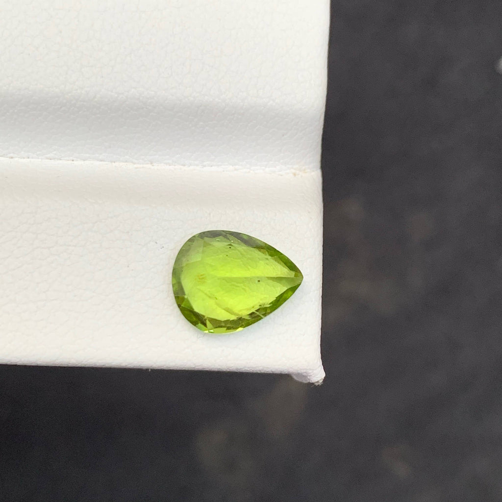 2.56 Carat Apple Green Peridot Green gemstone on a white 