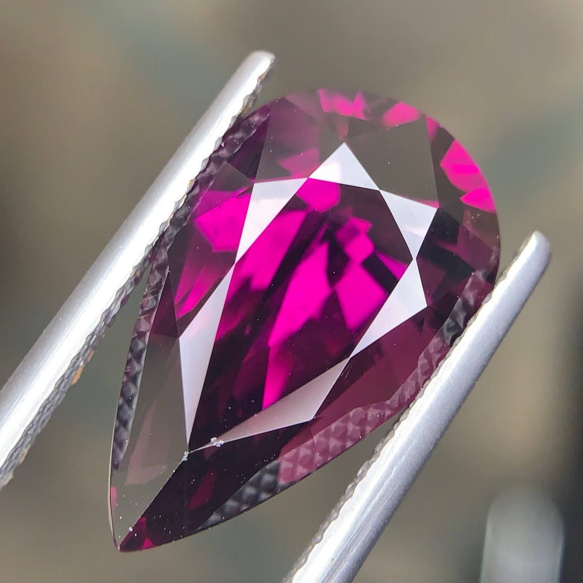 aig-certified-rhodolite-garnet-10-32-carat-pear-cut-tanzania-shop-now