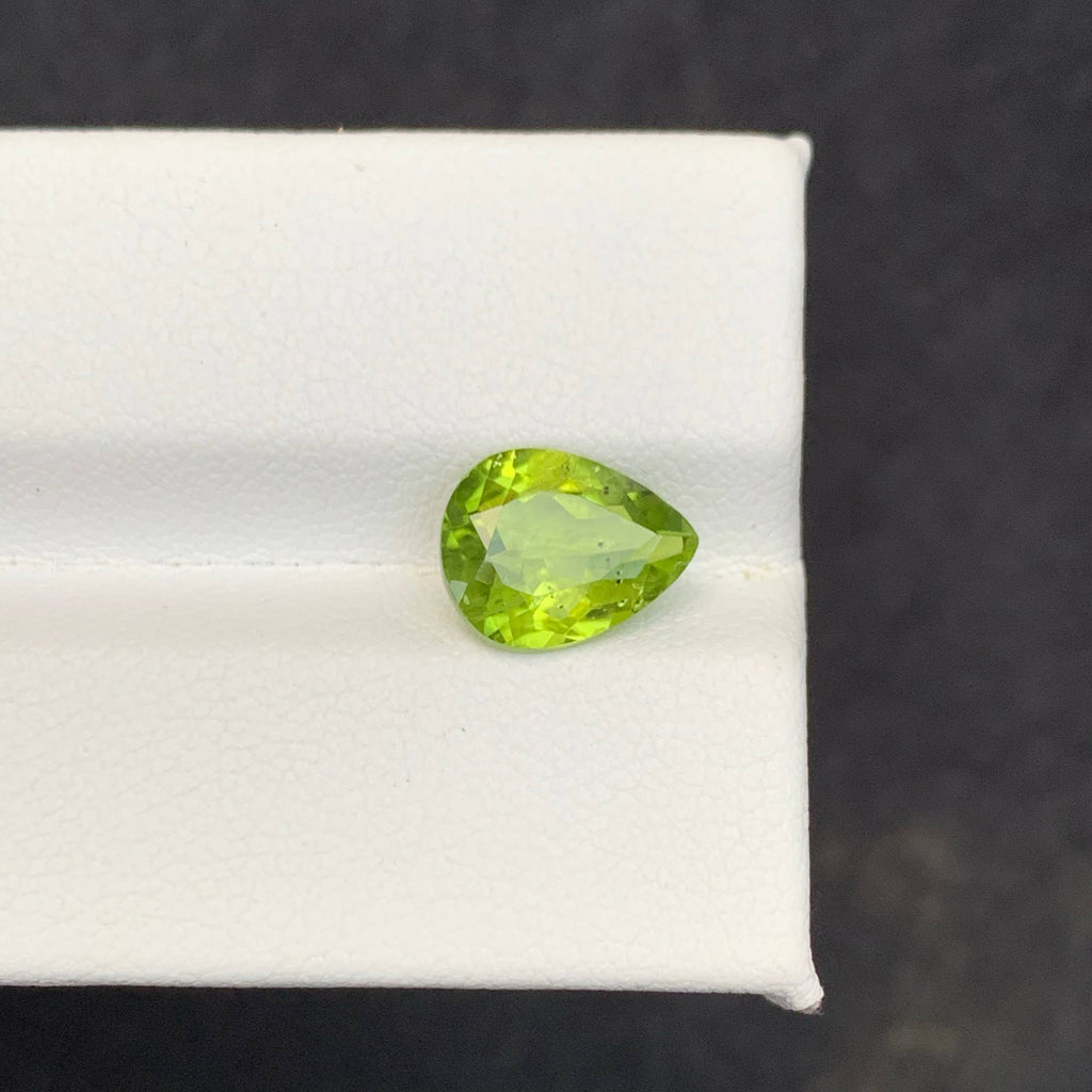 2.56 Carat Apple Green Peridot Green gemstone on a white 