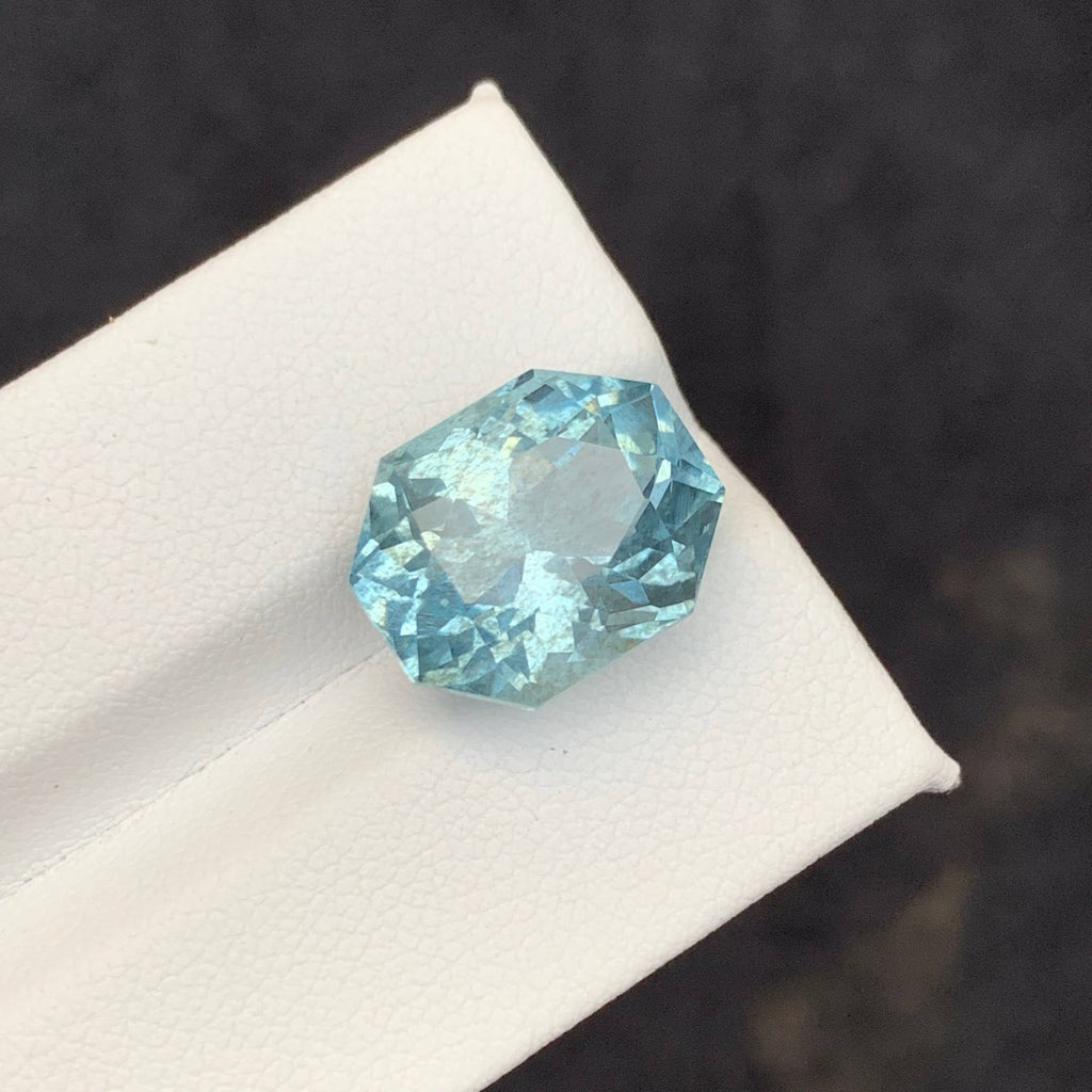 10.65 Carat Blue Aquamarine Faceted blue gemstone on a white 