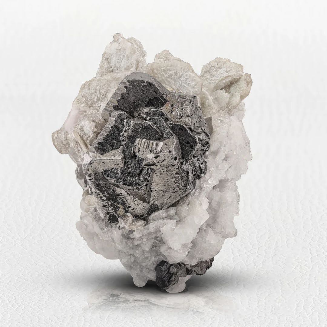 Rare Metallic Cassiterite Crystals on Albite with Apatite from Pakistan