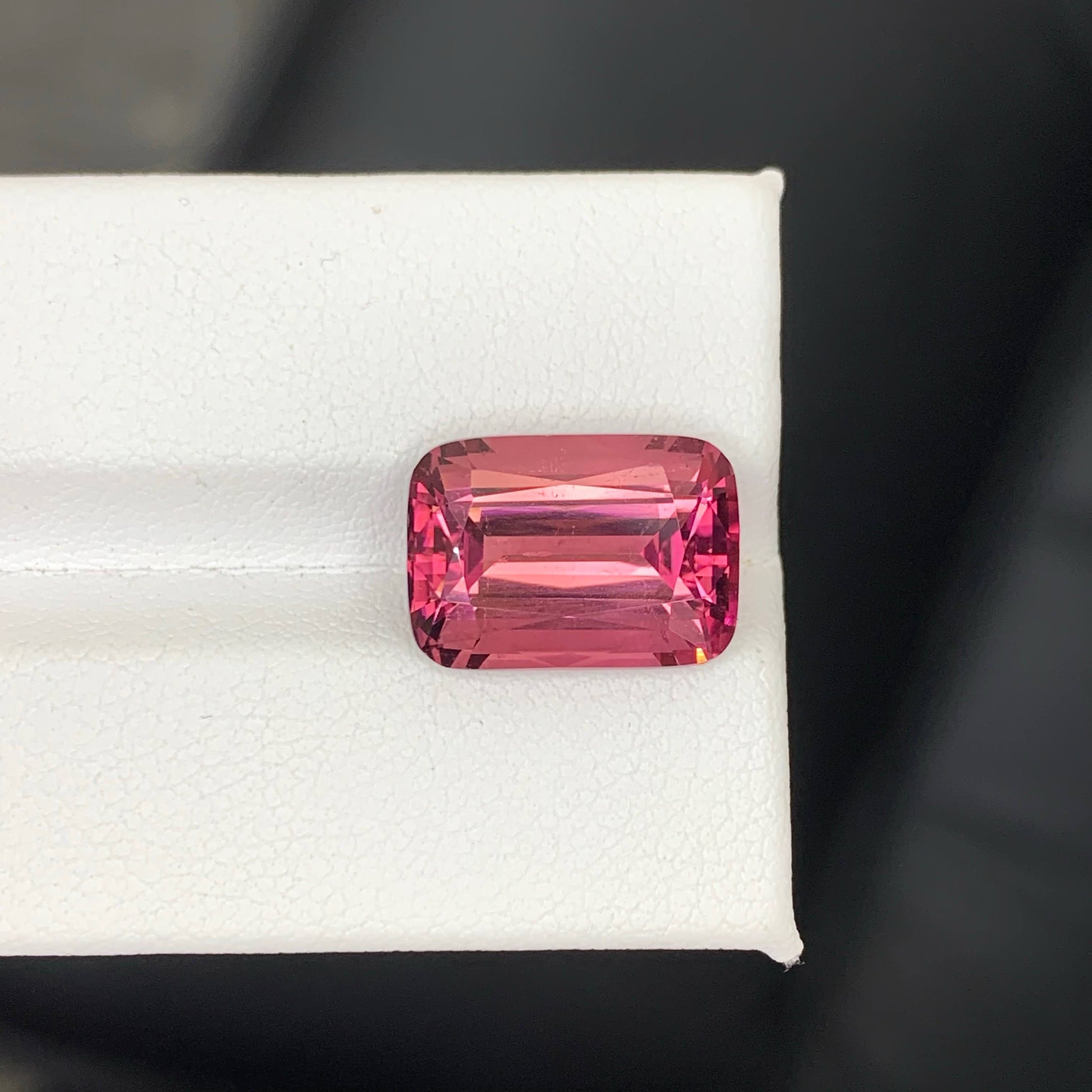 8.60 Carats Pink Tourmaline cushion cut pink gemstone on a white background