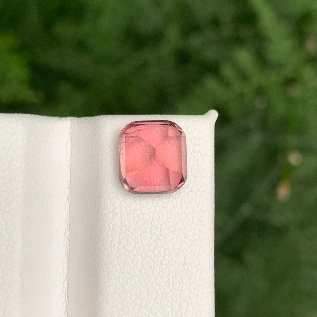 2.85 Carats Baby Pink Tourmaline
Pink gemstone on a white cloth with a blurred green background
