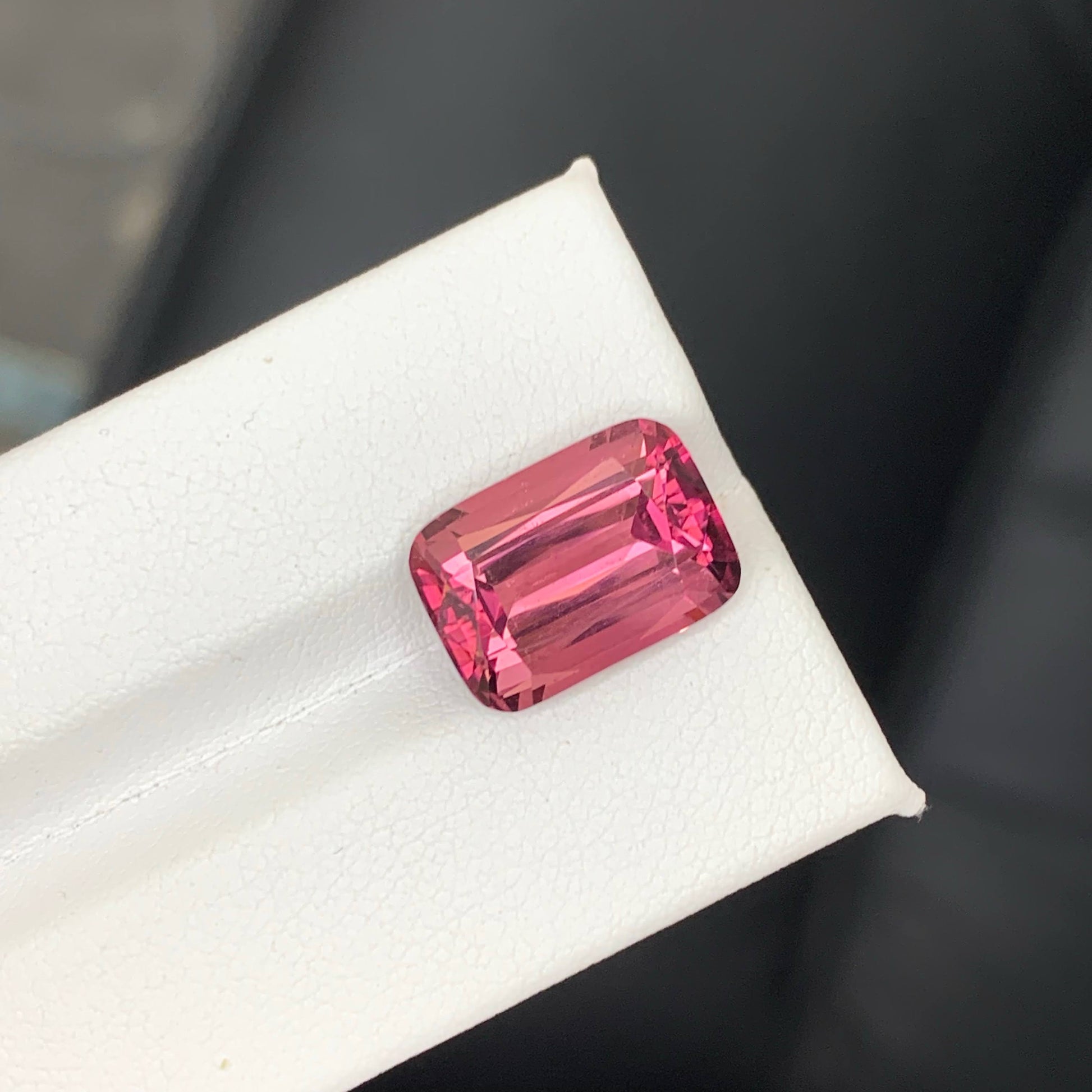 8.60 Carats Pink Tourmaline cushion cut pink gemstone on a white background