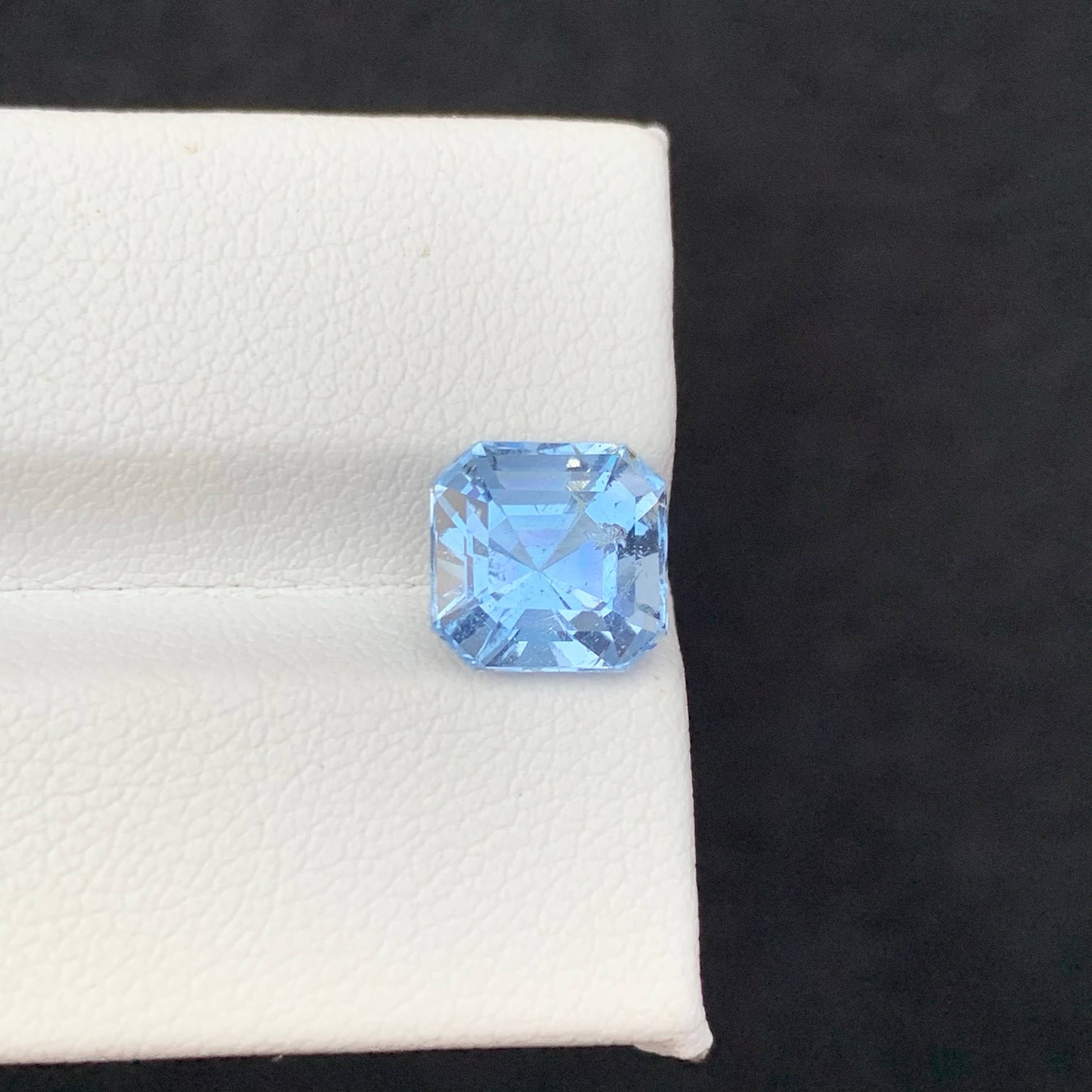 2.85 Carat Blue Aquamarine Blue gemstone on a white and black background