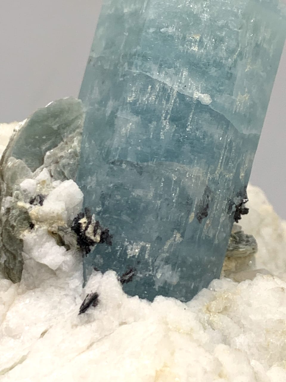 Aquamarine With Hematite Rosette On White Albite
