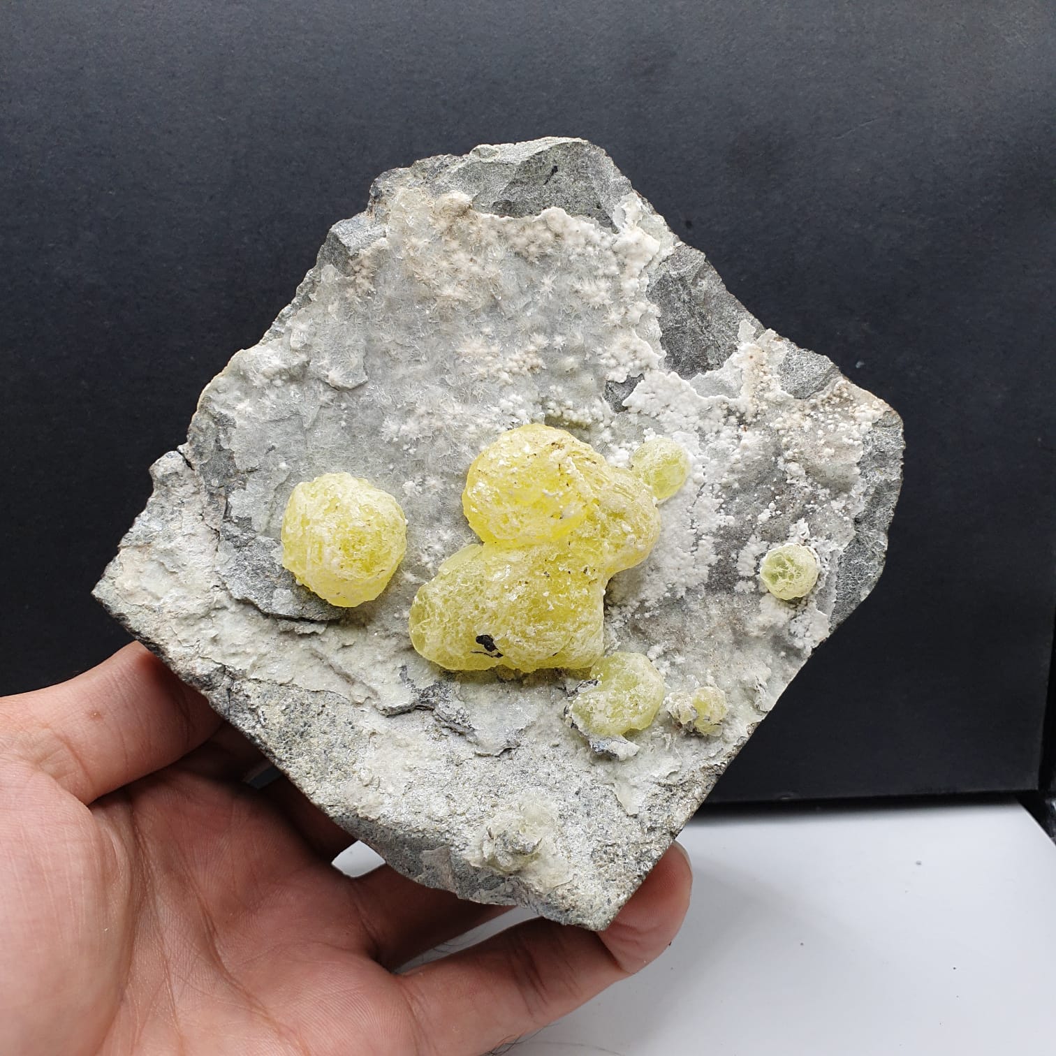 Colorful Isolated Rounded Brucite on White Hydromagnesite