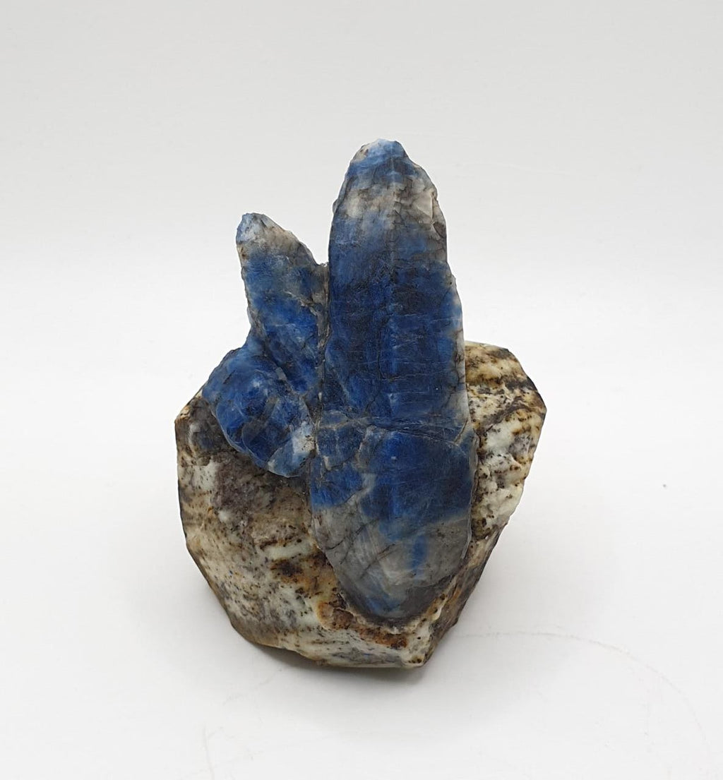 Elongated Afghanite Crystals Shooting Out of Matrix