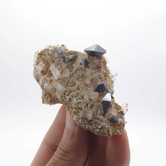 Featuring Isolated Anatase Crystals on Lemonite Matrix with Quartz