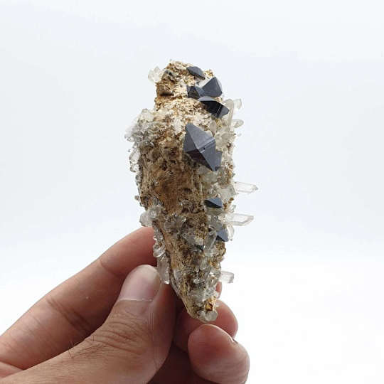 Featuring Isolated Anatase Crystals on Lemonite Matrix with Quartz