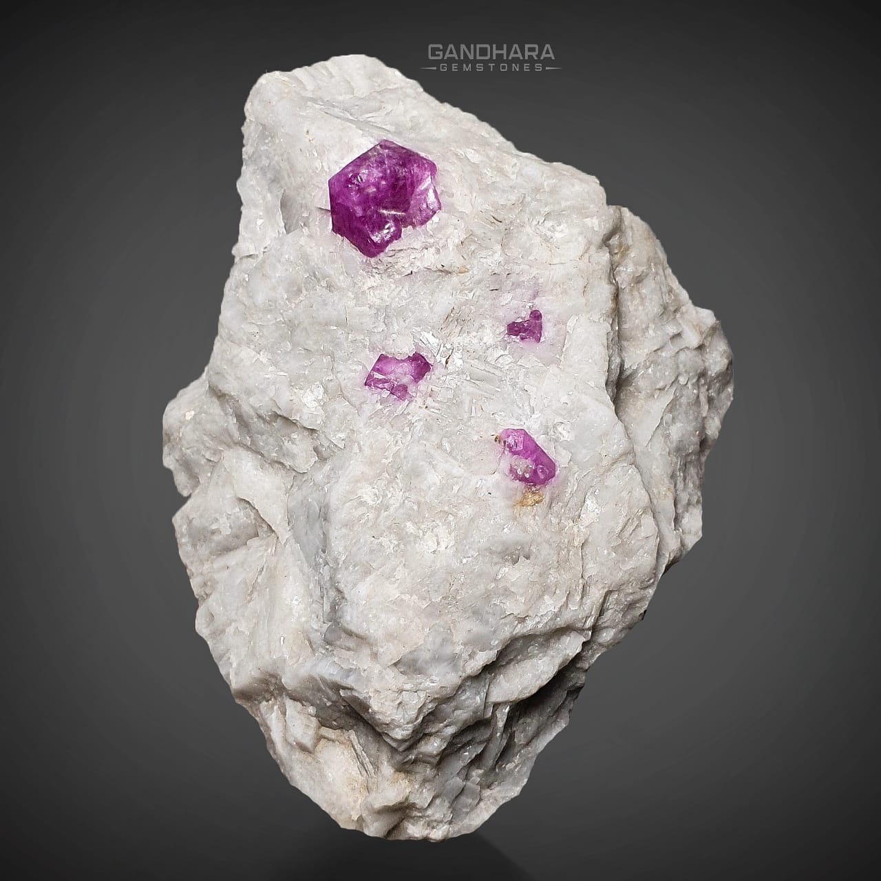 107 Grams Gemmy Ruby Crystals on Milky White Marble Matrix