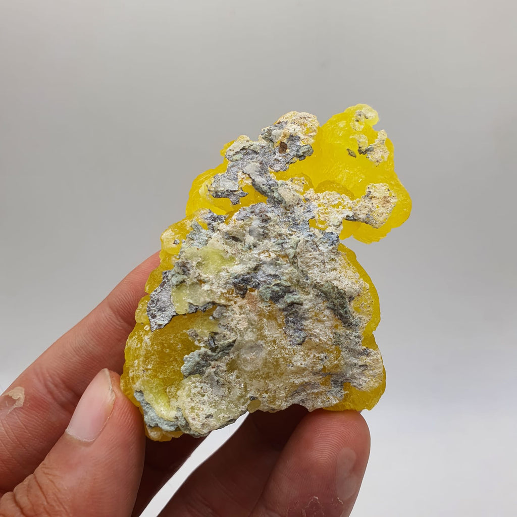 Lemon-Yellow Botryoidal Aggregate of Brucite with Detail Chromite Matrix