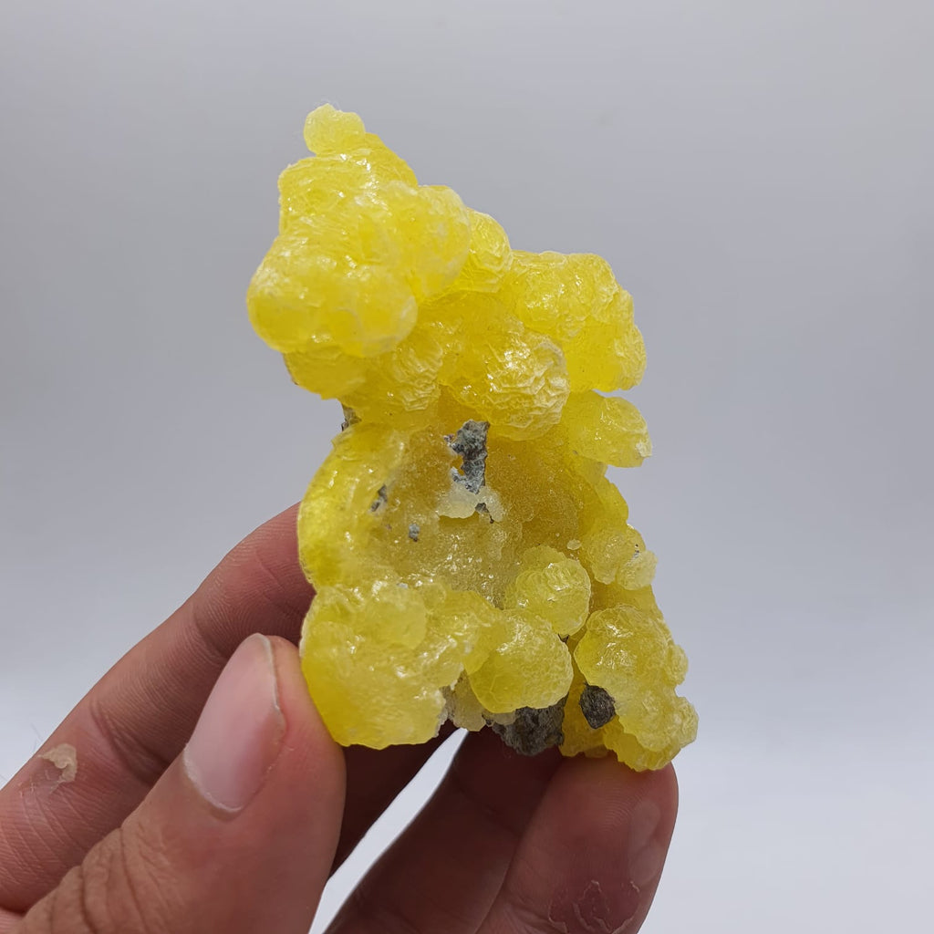 Lemon-Yellow Botryoidal Aggregate of Brucite with Detail Chromite Matrix
