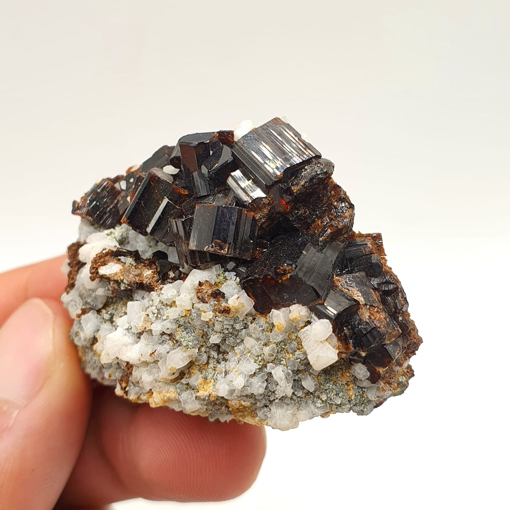 Luster Intergrown Crystals Of Vesuvianite On Contrasting White Matrix
