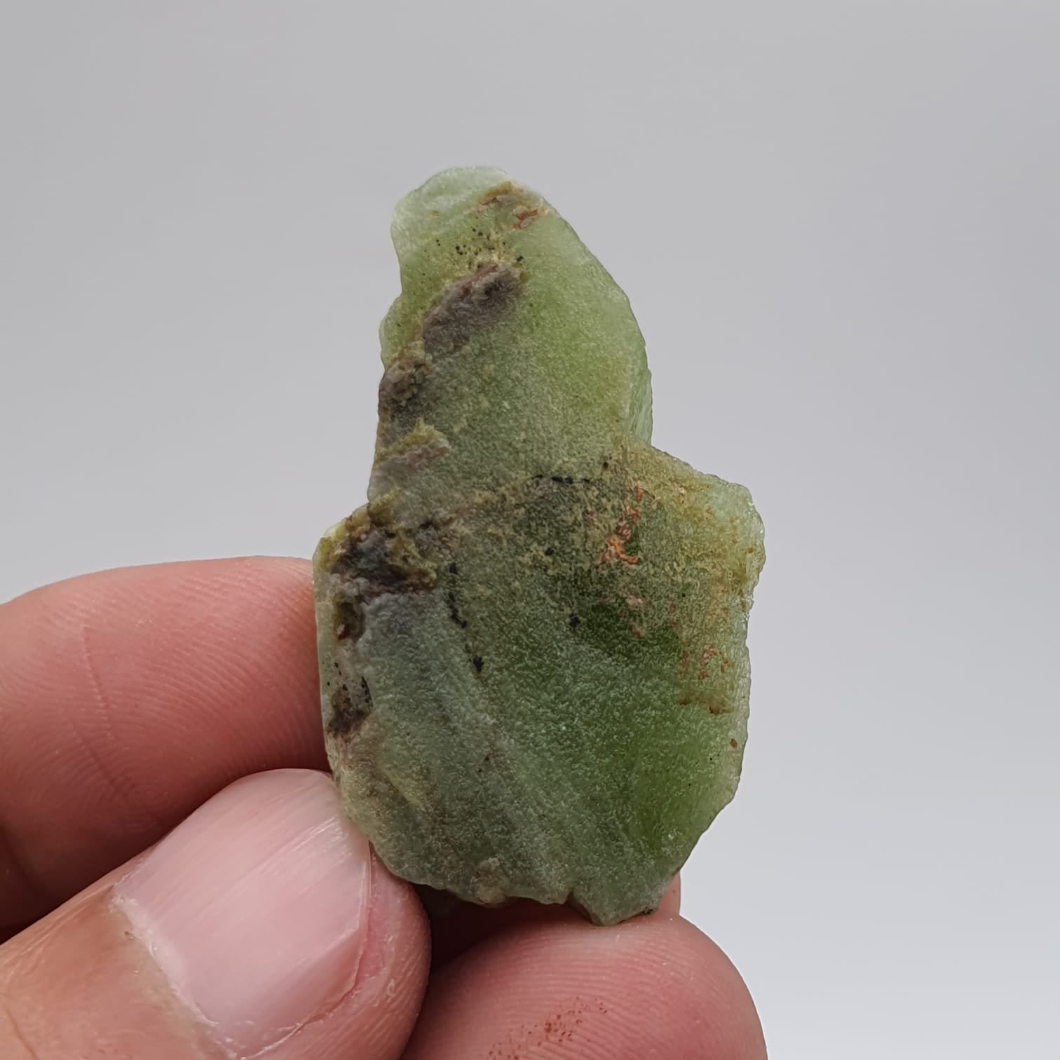 Lovely Apple-Green Peridot With Magnetite Crystals