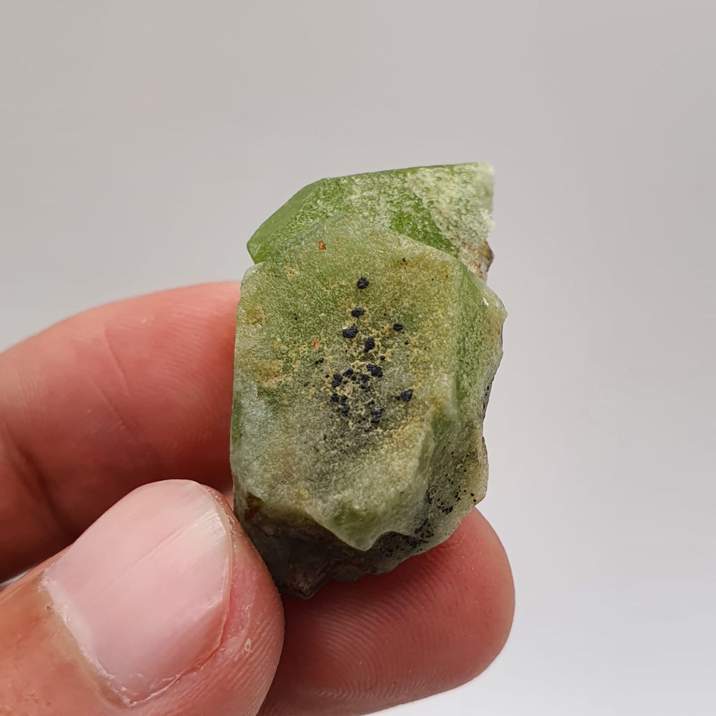 Lovely Apple-Green Peridot With Magnetite Crystals