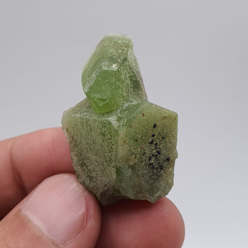 Lovely Apple-Green Peridot With Magnetite Crystals