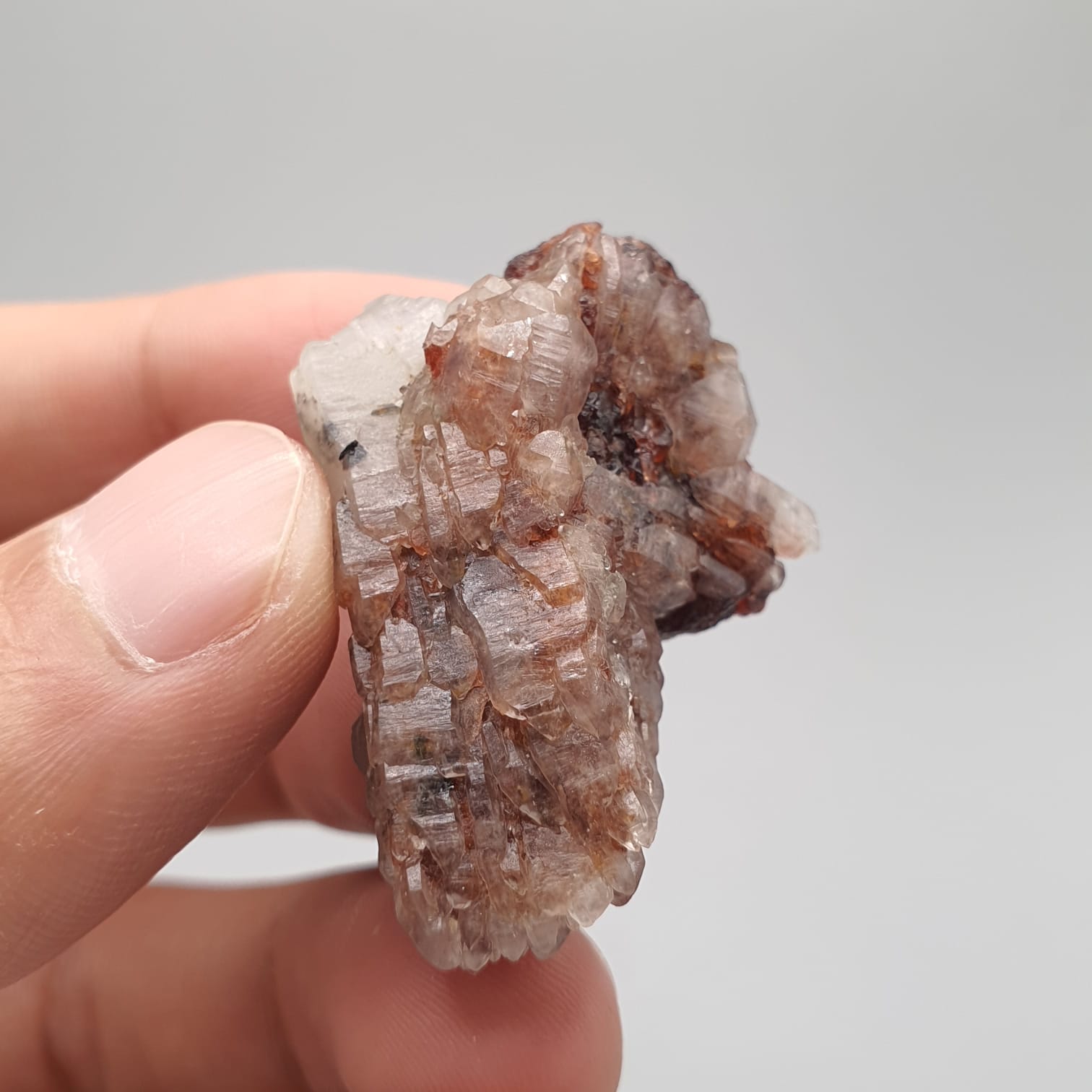 Red Spessartine Garnet Crystals On Quartz