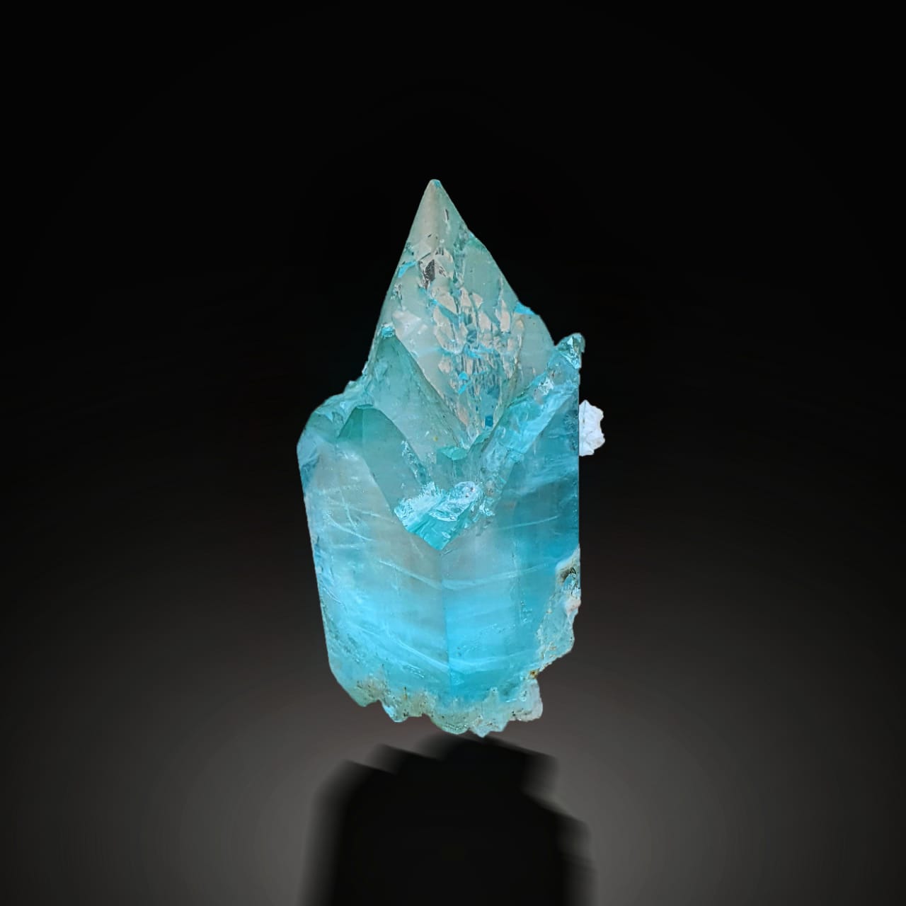 Turquoise crystal on a black background