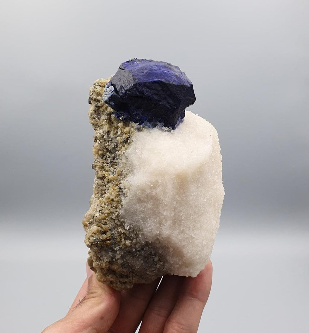Vibrant Blue Isomatric and Isolated Lazurite Ball on Calcite with Pyrite