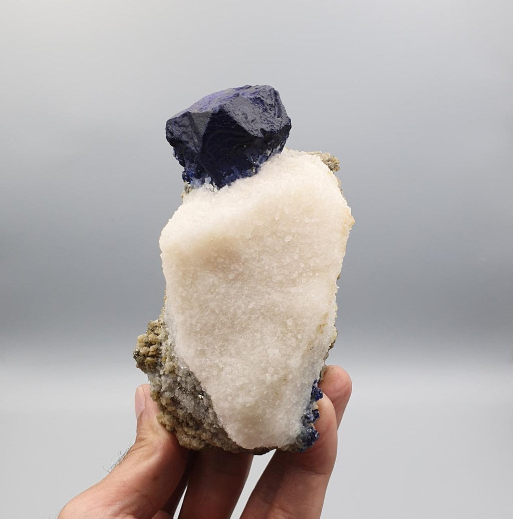 Vibrant Blue Isomatric and Isolated Lazurite Ball on Calcite with Pyrite