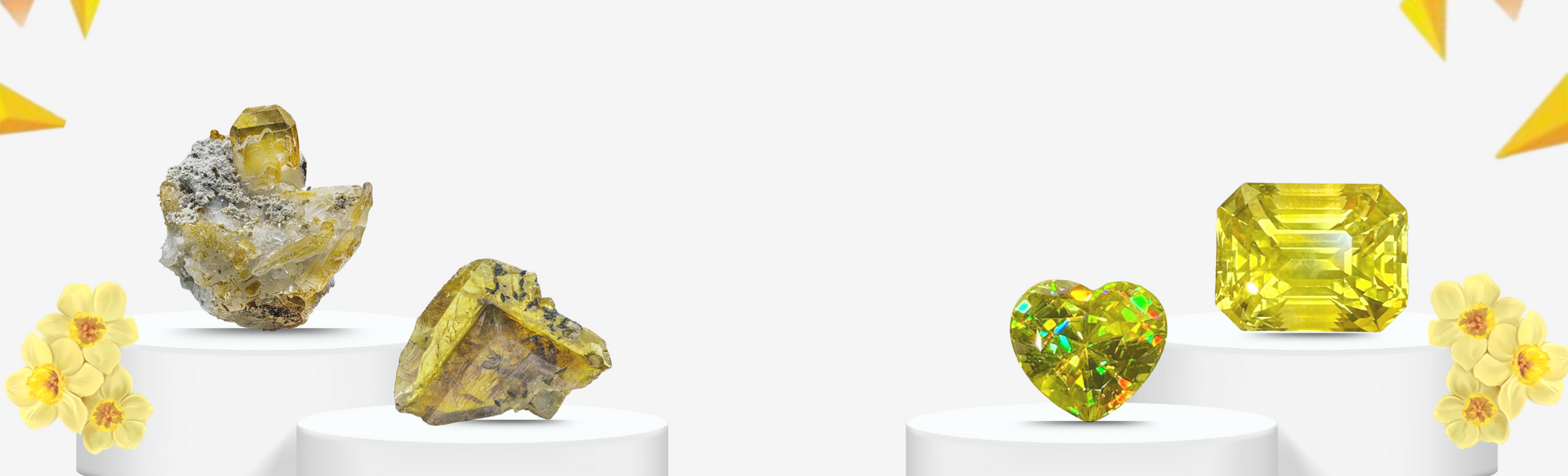 Collection of yellow gemstones on a white background at Gandhara Fine Minerals