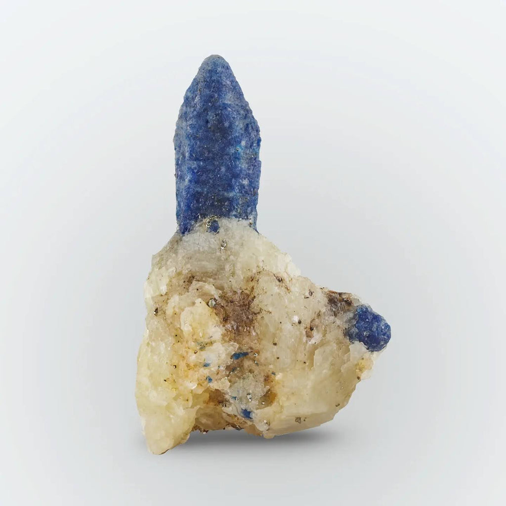 Isolated pointed Afghanite crystal free standing on Calcite matrix from Afghanistan