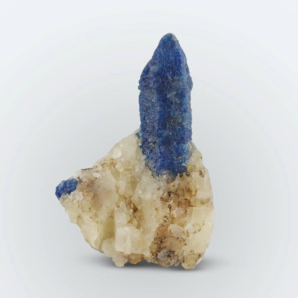 Isolated pointed Afghanite crystal free standing on Calcite matrix from Afghanistan