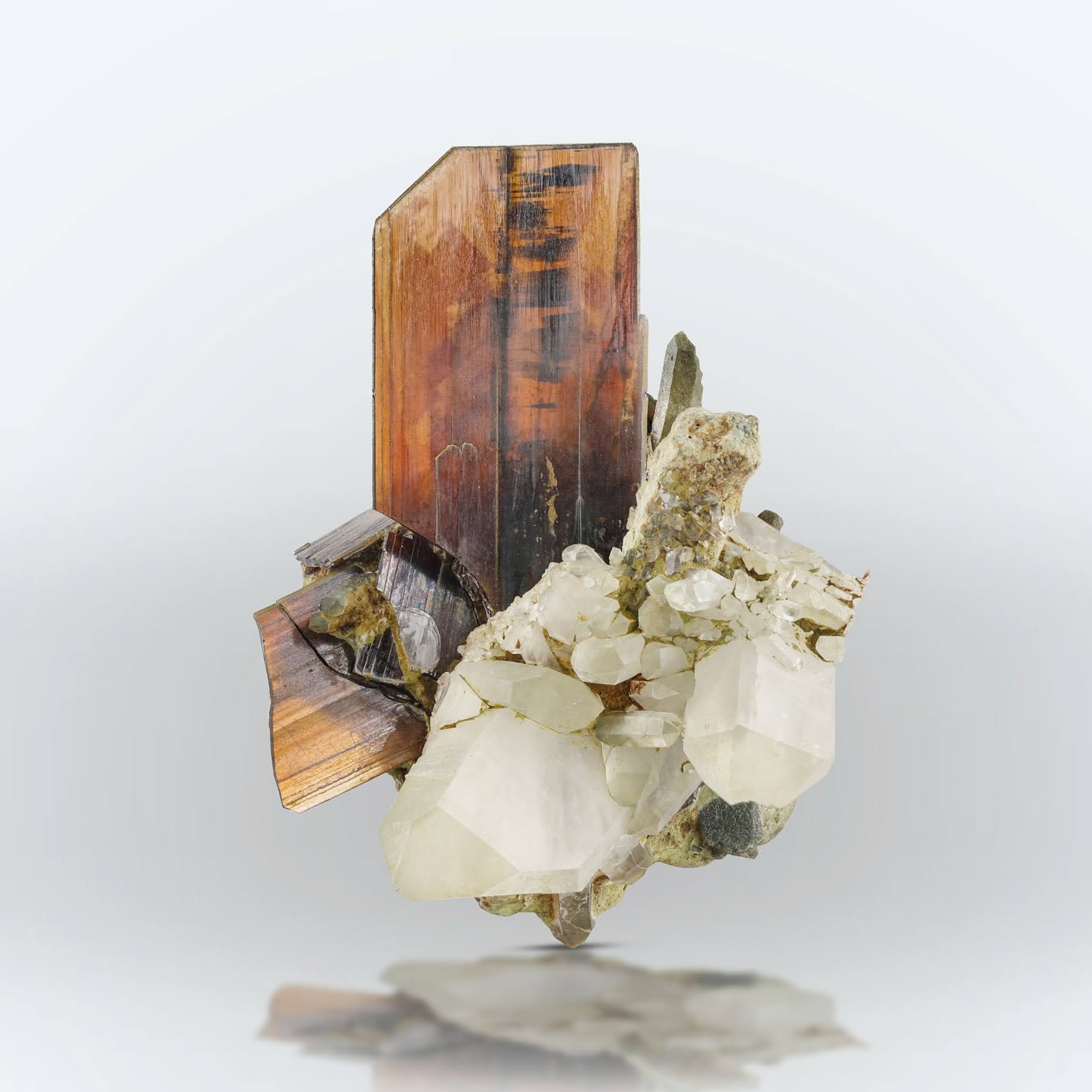 Tabular vibrant red color Brookite crystal on Quartz from Pakistan