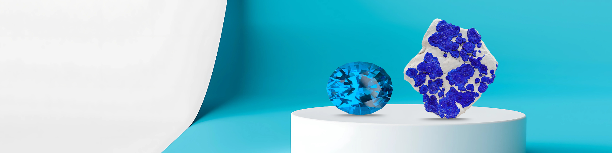 Two blue gemstones on a white pedestal against a teal background