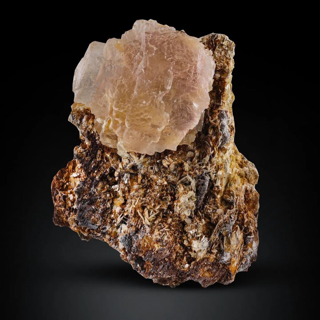 Isolated etched Pink Fluorite on Muscovite Specimen from Pakistan