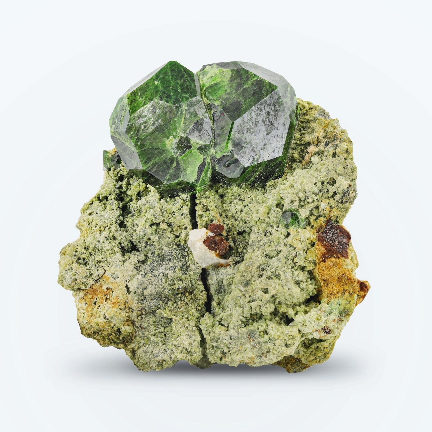 couple of isomatric Demantoid Green Garnet crystals on matrix from Iran