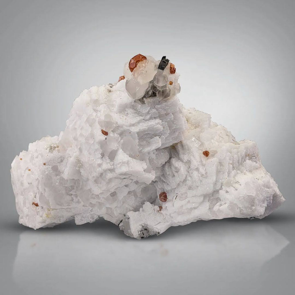 Natural Hassonite Garnet crystals on Quartz with Schorl from Pakistan