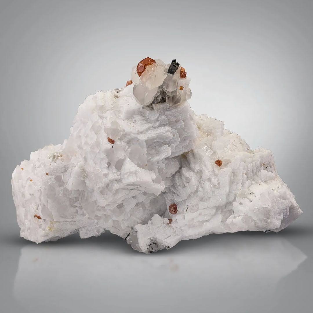 Natural Hassonite Garnet crystals on Quartz with Schorl from Pakistan