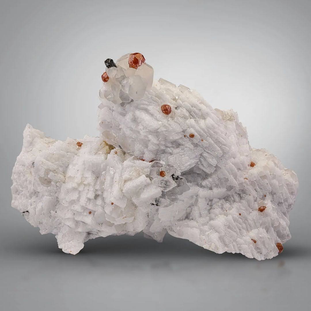 Natural Hassonite Garnet crystals on Quartz with Schorl from Pakistan