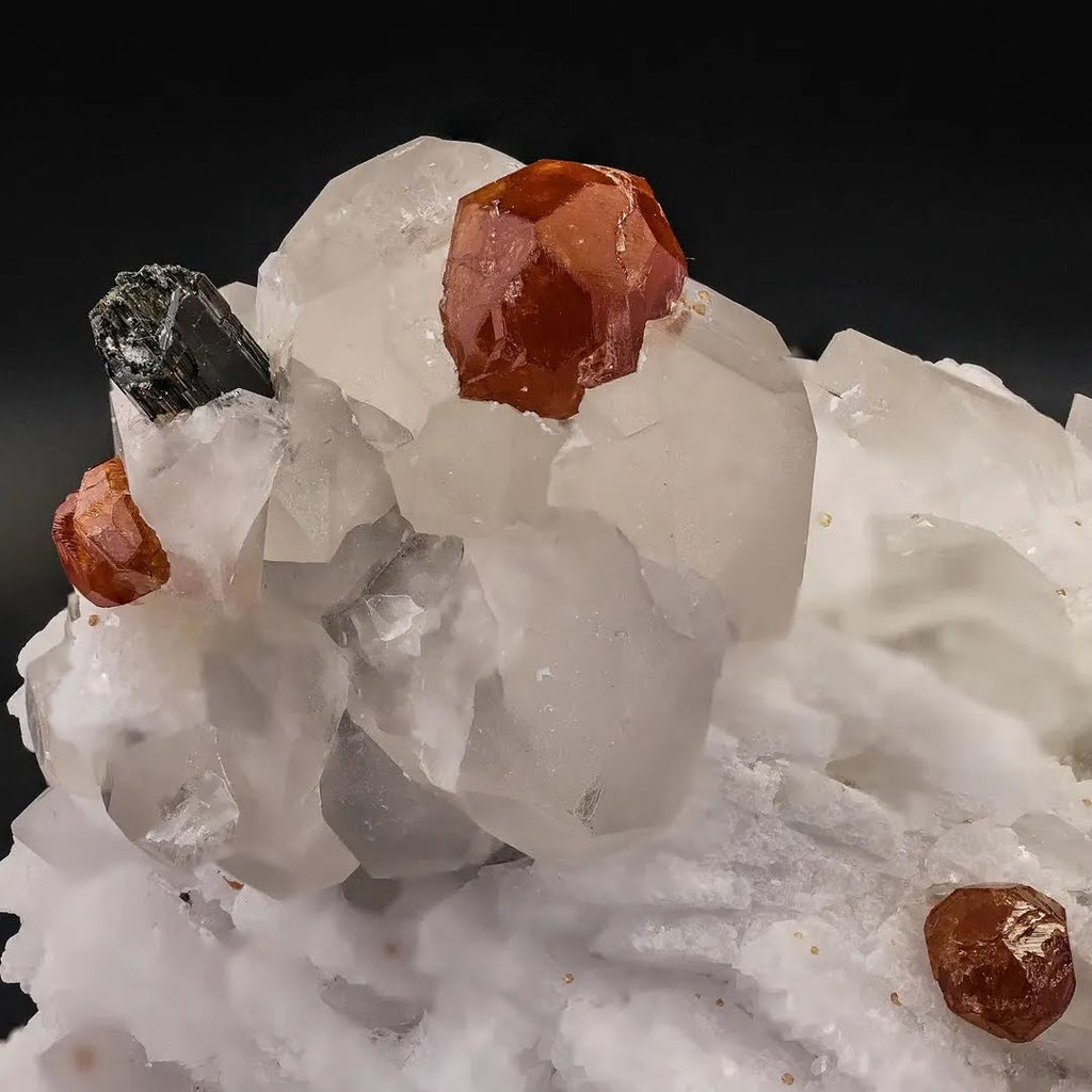 Natural Hassonite Garnet crystals on Quartz with Schorl from Pakistan
