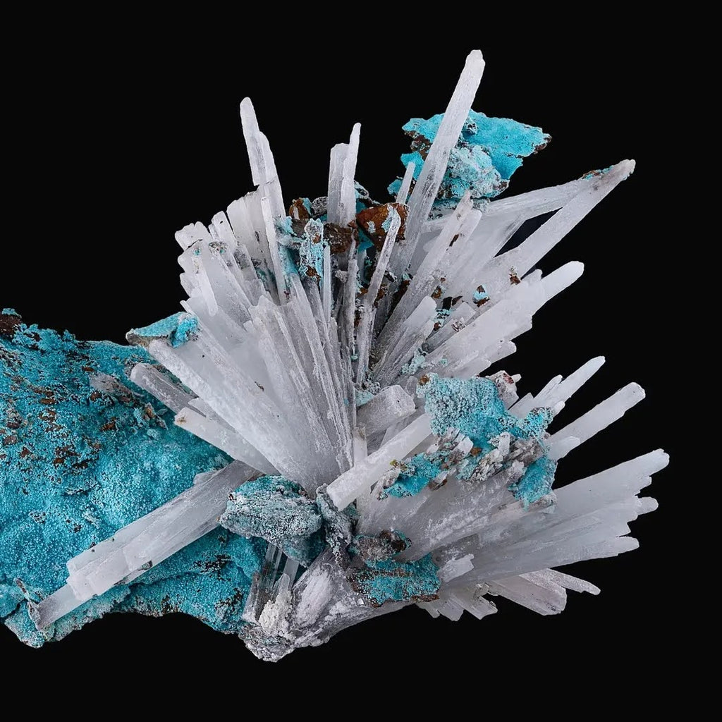 Crystal formation with turquoise and white colors on a black background