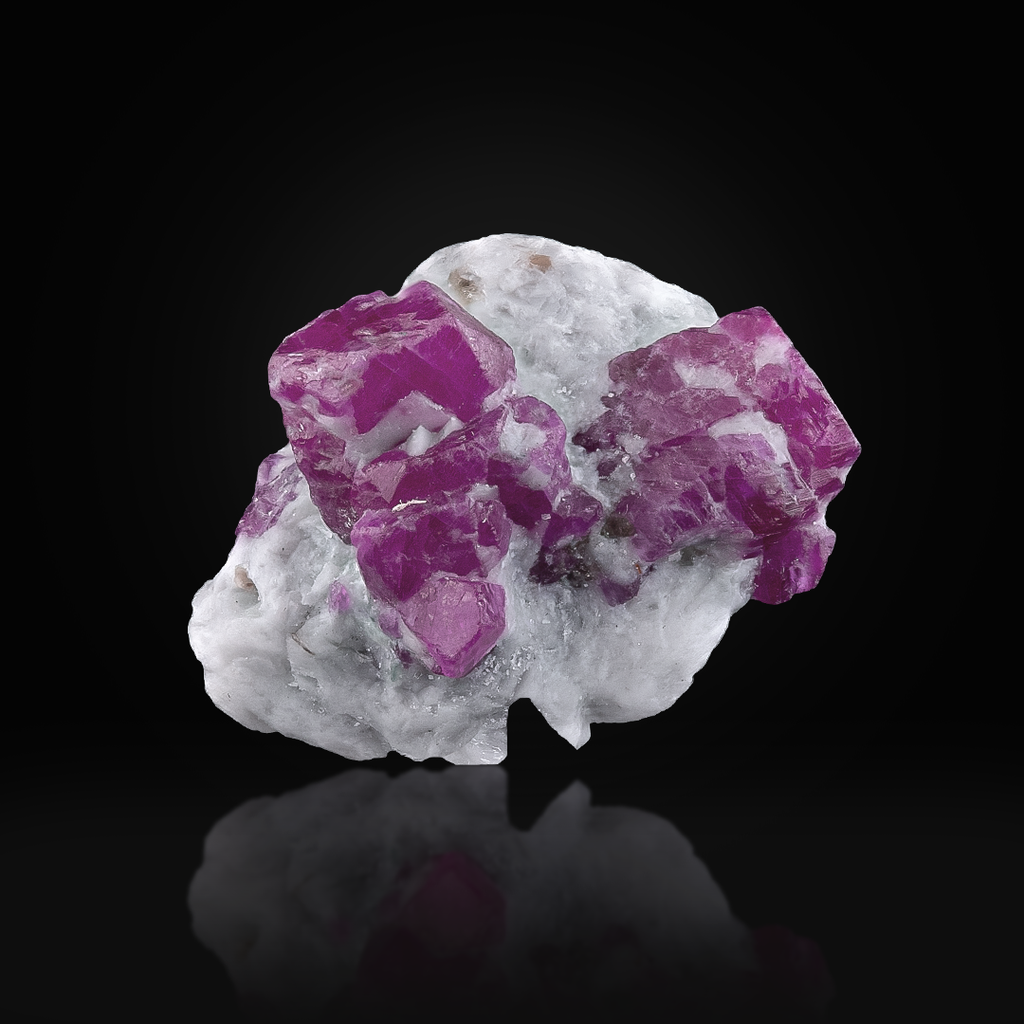 Red Ruby Crystals on Marble