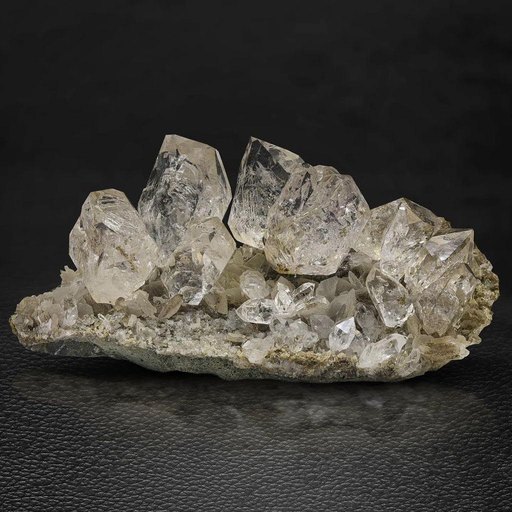 Isolated Diamond Quartz Crystals on Calcite from Pakistan