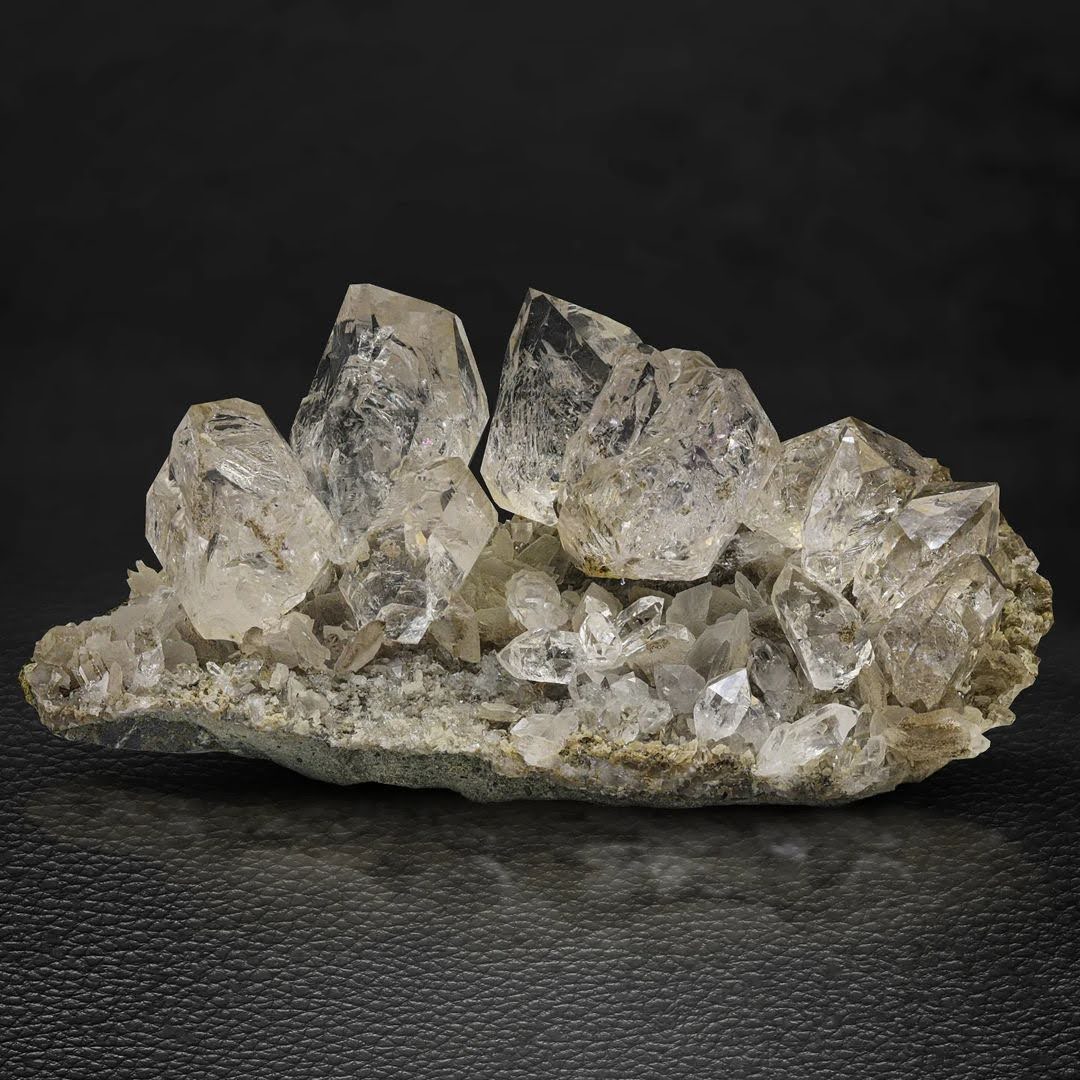 Isolated Diamond Quartz Crystals on Calcite from Pakistan