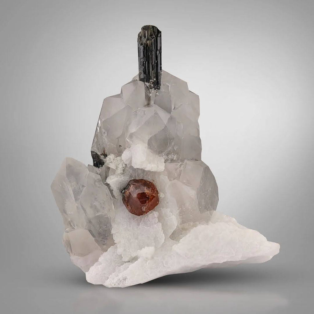 specimen of Hassonite Garnet on Quartz with Schorl from Pakistan
