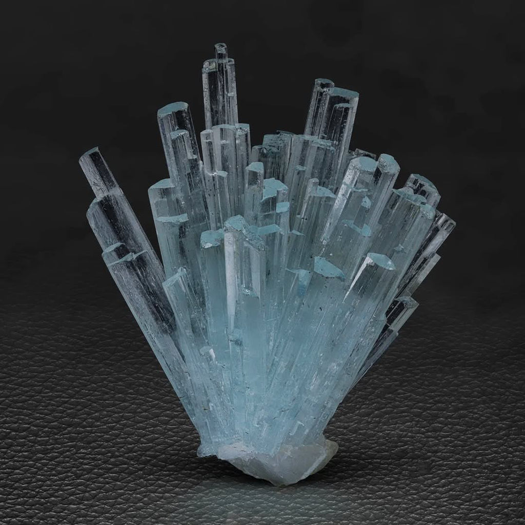 Cluster of Elongated Aquamarine Crystals with Quartz from Pakistan