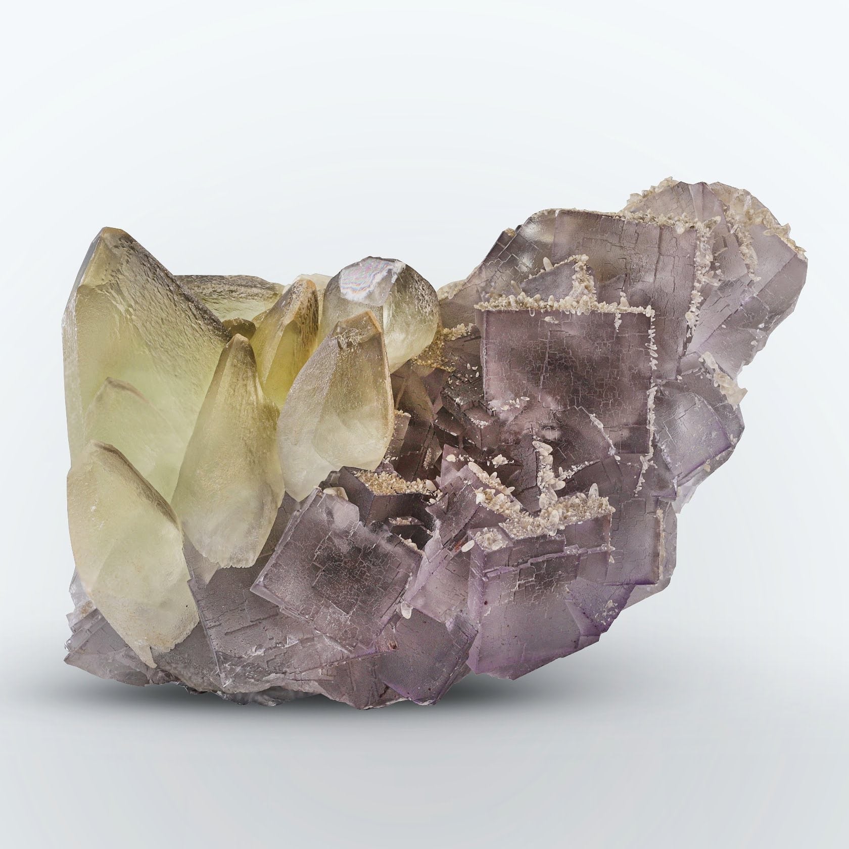 cluster of Calcite crystals on Purple color Fluorite from Pakistan