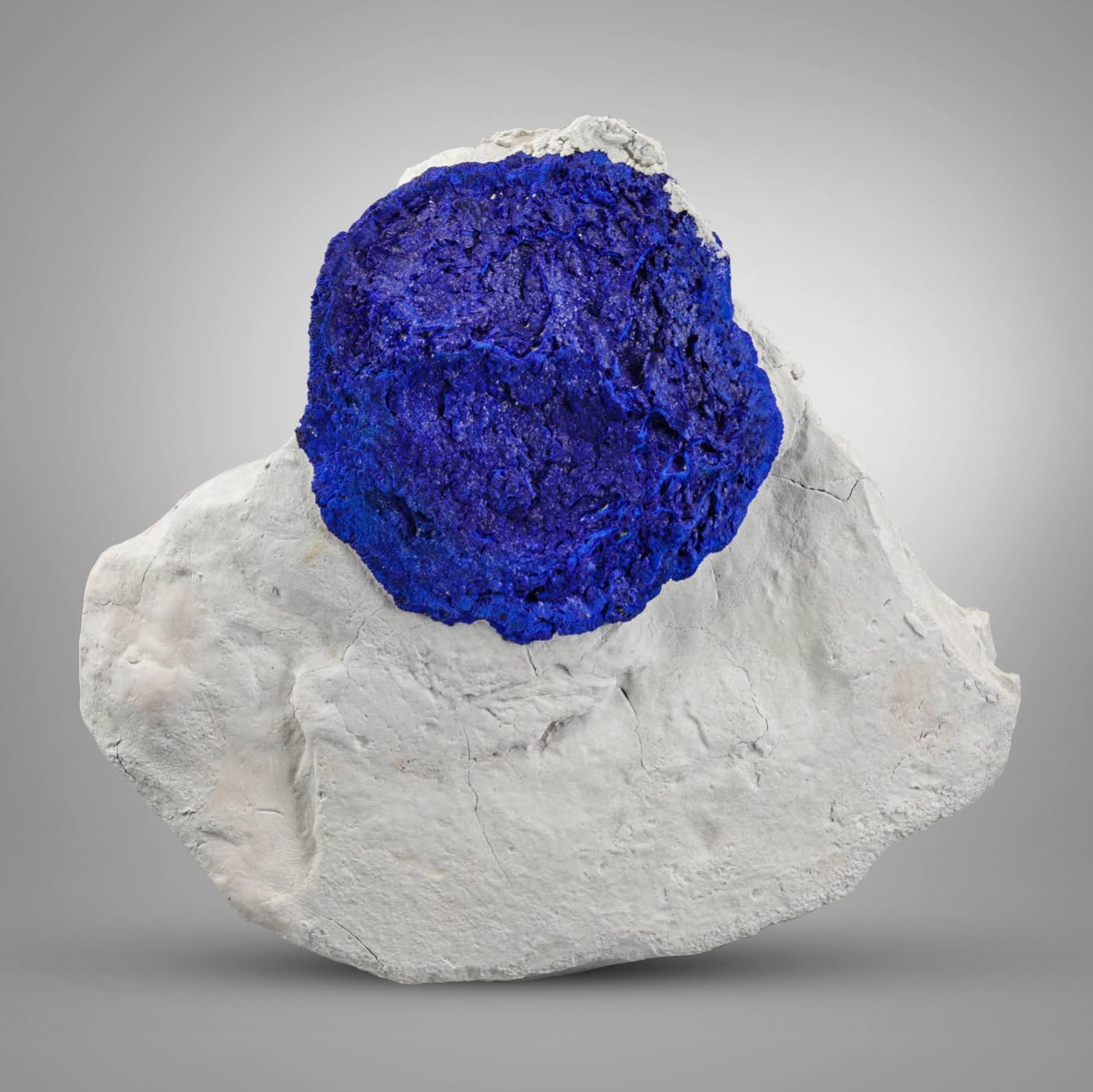 azure blue isolated crystal of Azurite on Kaolinite matrix from Australia
