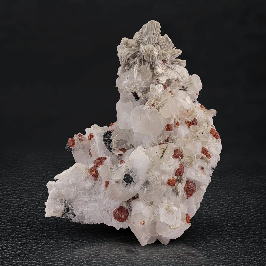 Specimen of Red Hassonite Garnet on Albite with Mica from Pakistan